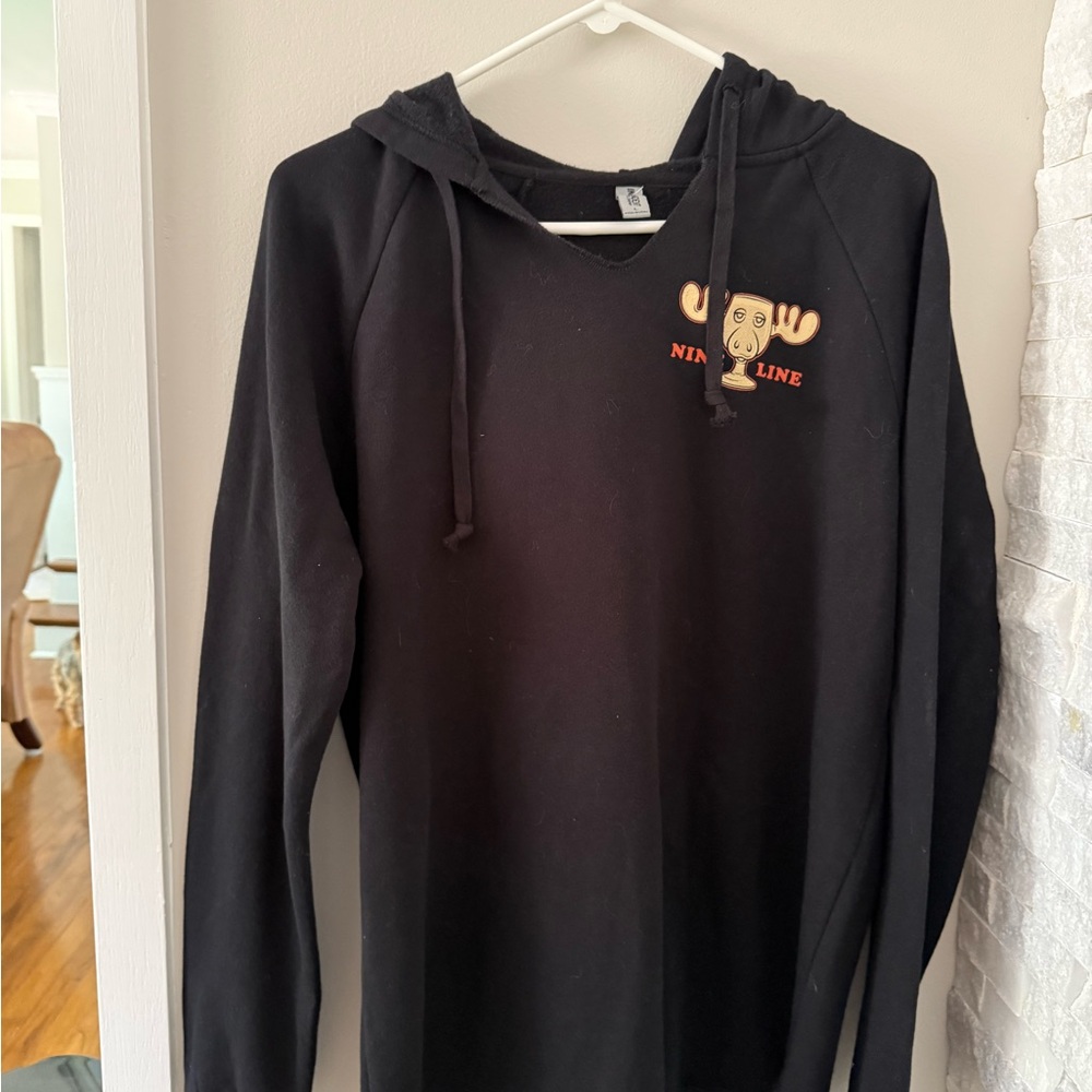 Black Men's or women’s hooded sweatshirt with hood.